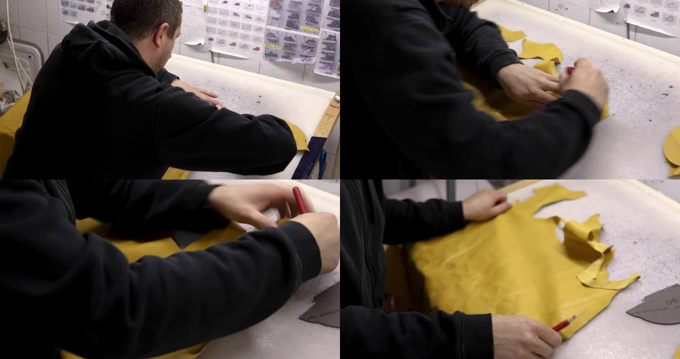 皮匠使用手术刀和金属图案从黄色皮革上切下儿童鞋的零件