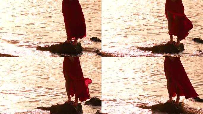 海边沙滩的红裙女人