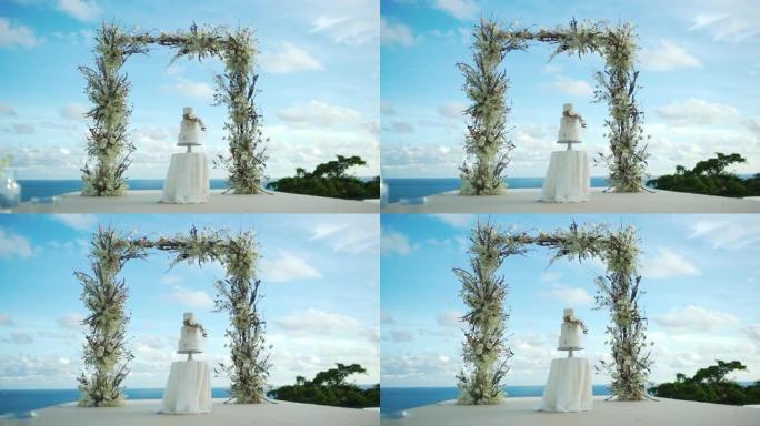 白色婚礼蛋糕装饰花多莉拍摄，泰国普吉岛。