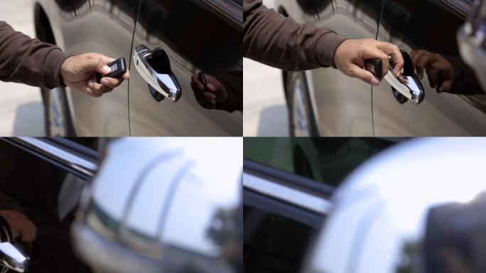 特写男性手持汽车钥匙。男子通过车门附近的遥控钥匙按钮解锁车门，并打开上车。