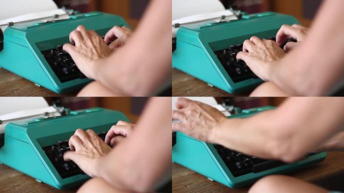 女人的手在一台旧打字机上打字