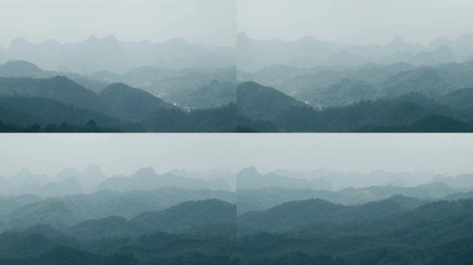 山脉的平移视图高山峰森林海云海翻滚云雾