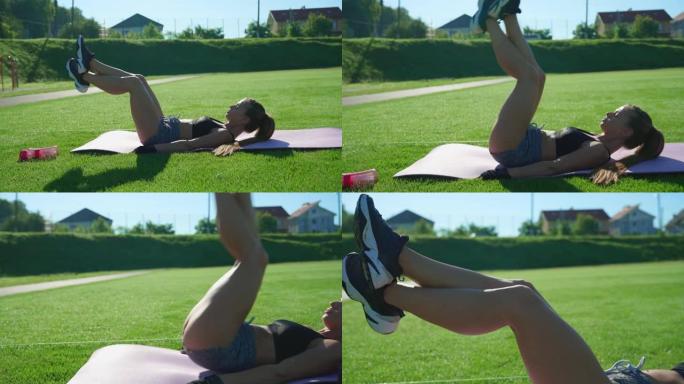 女人在户外练习抬腿运动。
