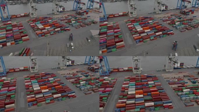 德国汉堡工业航运港口的叉车和彩色货物集装箱