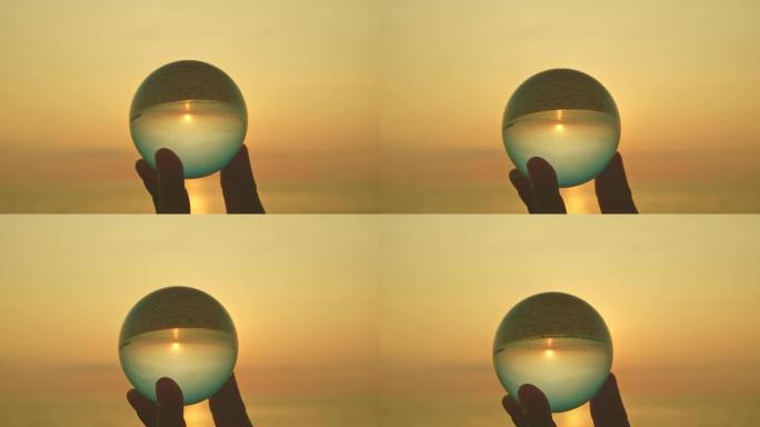 你手上的水晶球里的神奇日落景色。