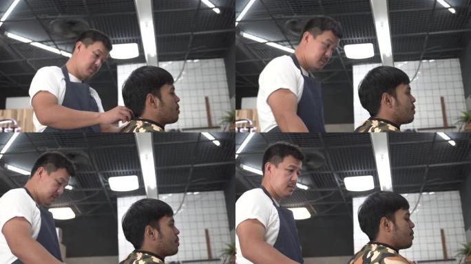 理发店老板和顾客。