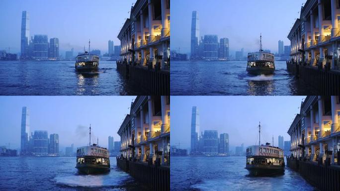 天星小轮在晚上以香港中央天际线抵达九龙码头。-中枪