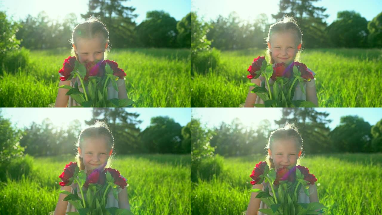 夏天户外，快乐可爱的小女孩带着花束牡丹的肖像。微笑可爱的女孩孩子拿着花在相机里看。童年，幸福，春假，