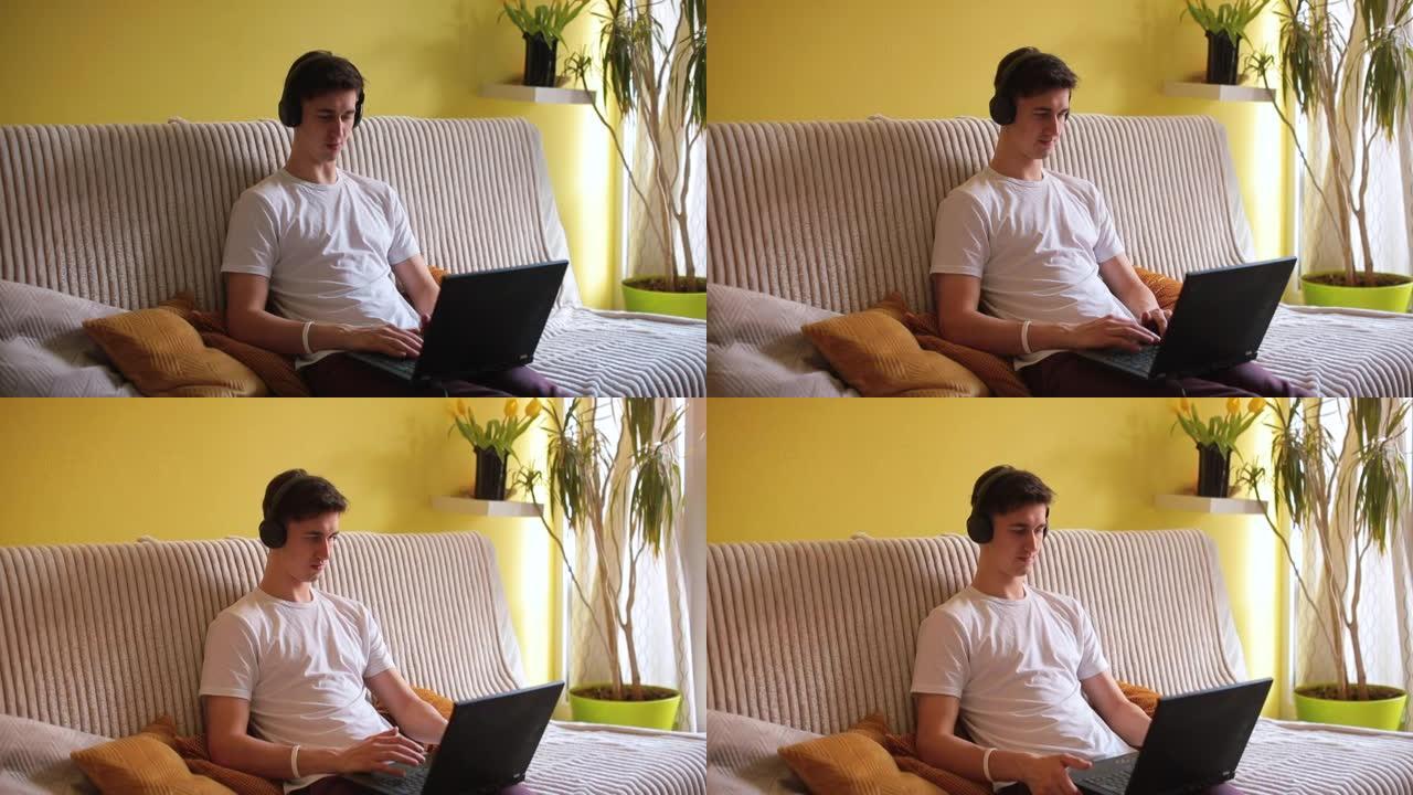 男子使用笔记本电脑进行视频对话房间使用互联网传输消息