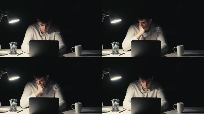 深夜工作失眠困倦员工笔记本电脑