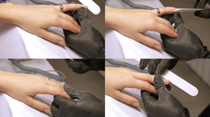 修指甲过程。女性指甲的矫正