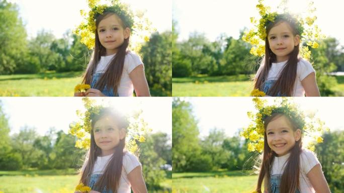 一个可爱的小女孩的肖像，头上戴着花环，手里拿着蒲公英，她在夕阳的背景下看着相机