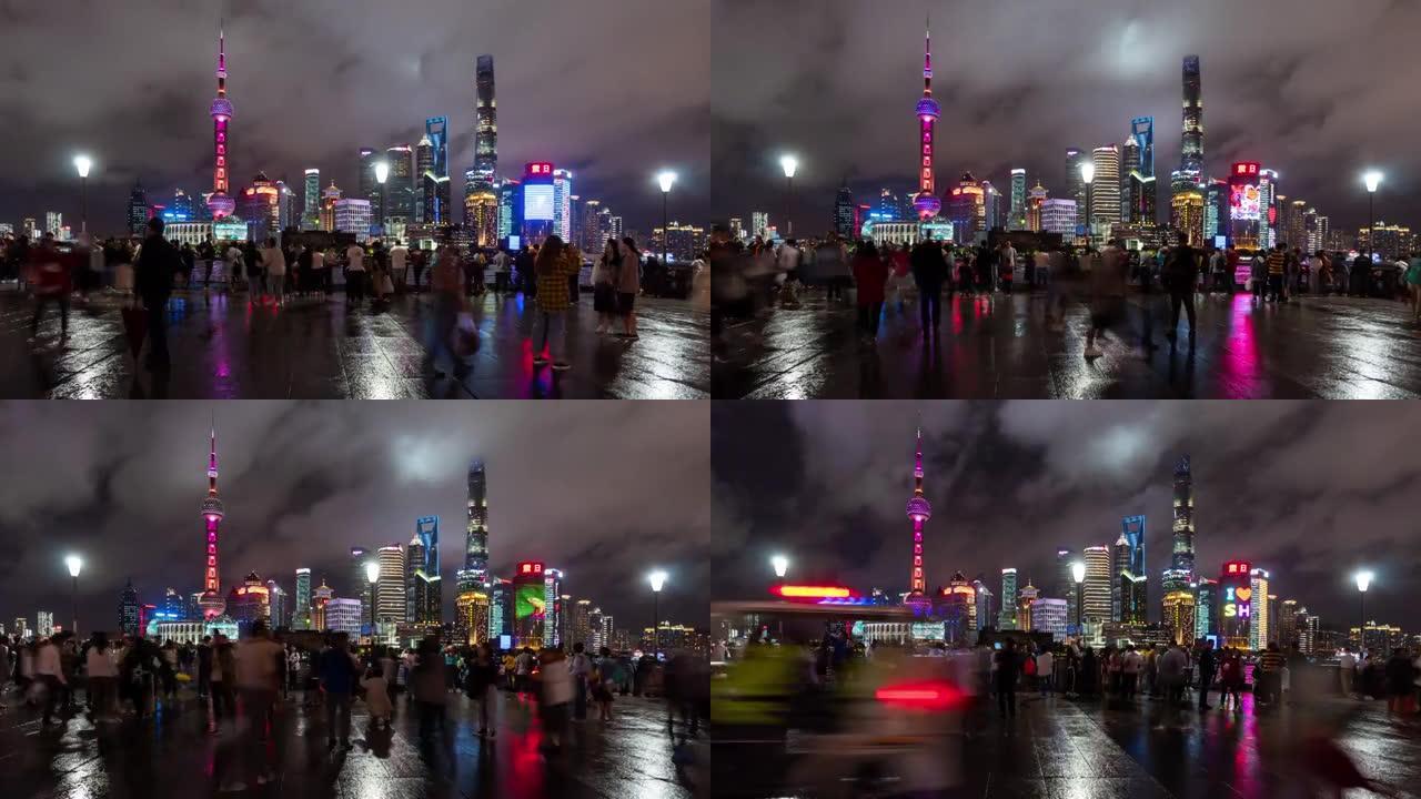 4k时间流逝: 人们在中国上海外滩观光点步行和拍摄陆家嘴摩天大楼灯光秀的照片。