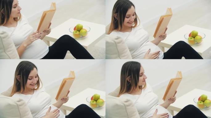 4k slowmotion孕妇看书摸着肚子的视频。