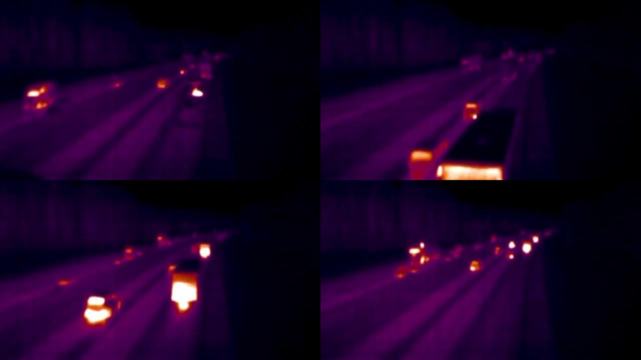 带有移动汽车的高速公路的热成像视图。红外、热成像、夜视成像