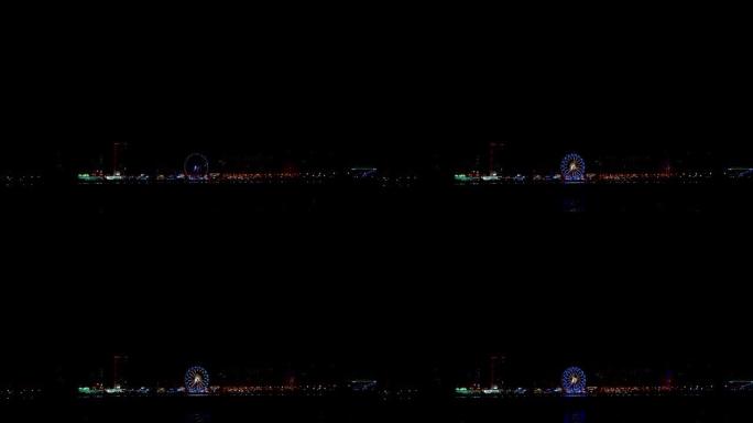 4k视频。摩天轮和夜晚的城市全景。俄罗斯喀山-2021年5月8日