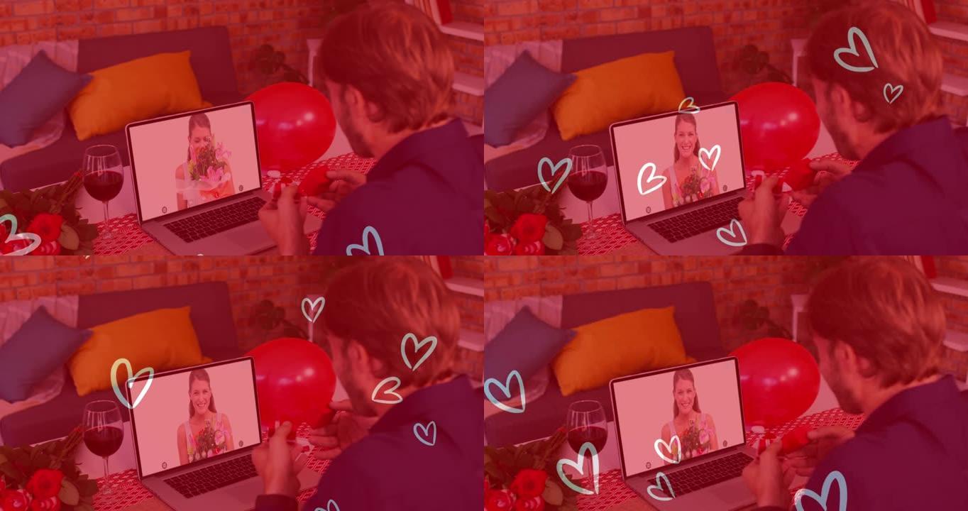 白人男子的心脏图标在笔记本电脑上进行视频通话时显示戒指
