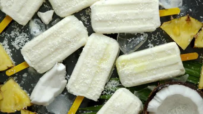 用椰奶和菠萝制成的自制素食冰棍。美味健康夏季小吃