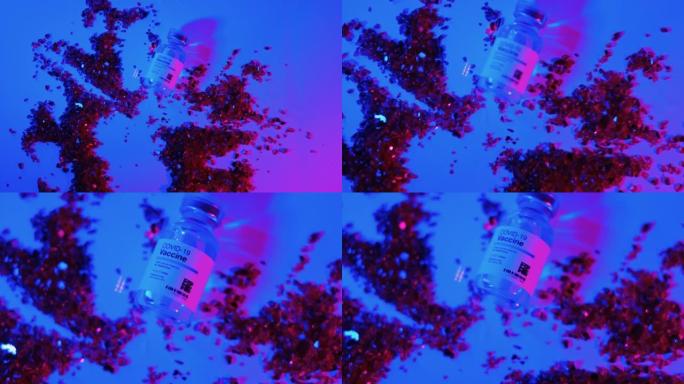 新型冠状病毒肺炎疫苗瓶的幻觉，光谱在实验室桌上闪烁蓝色和粉红色的光。免疫概念