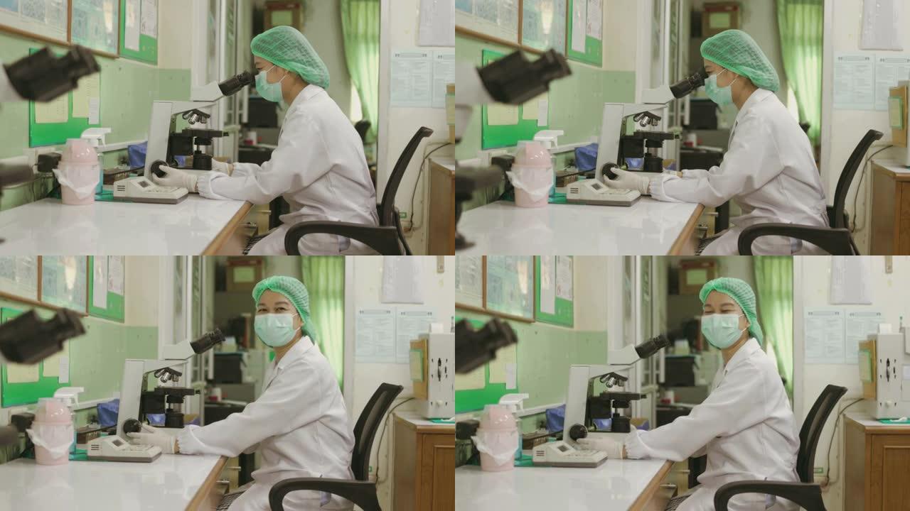 东南亚医生在办公室的面具后面微笑-股票视频