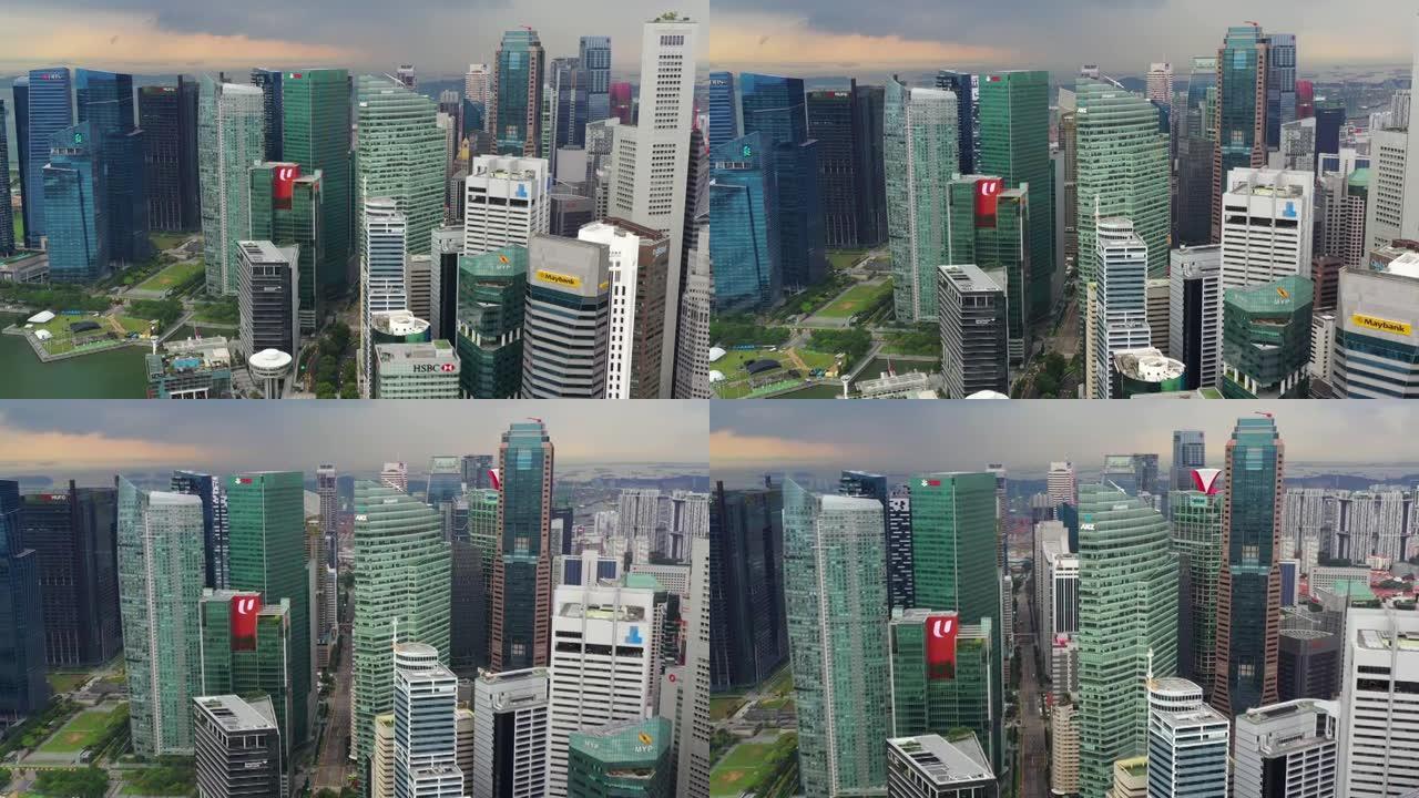 日落时间风暴天空新加坡城市现代市中心金融区空中全景4k