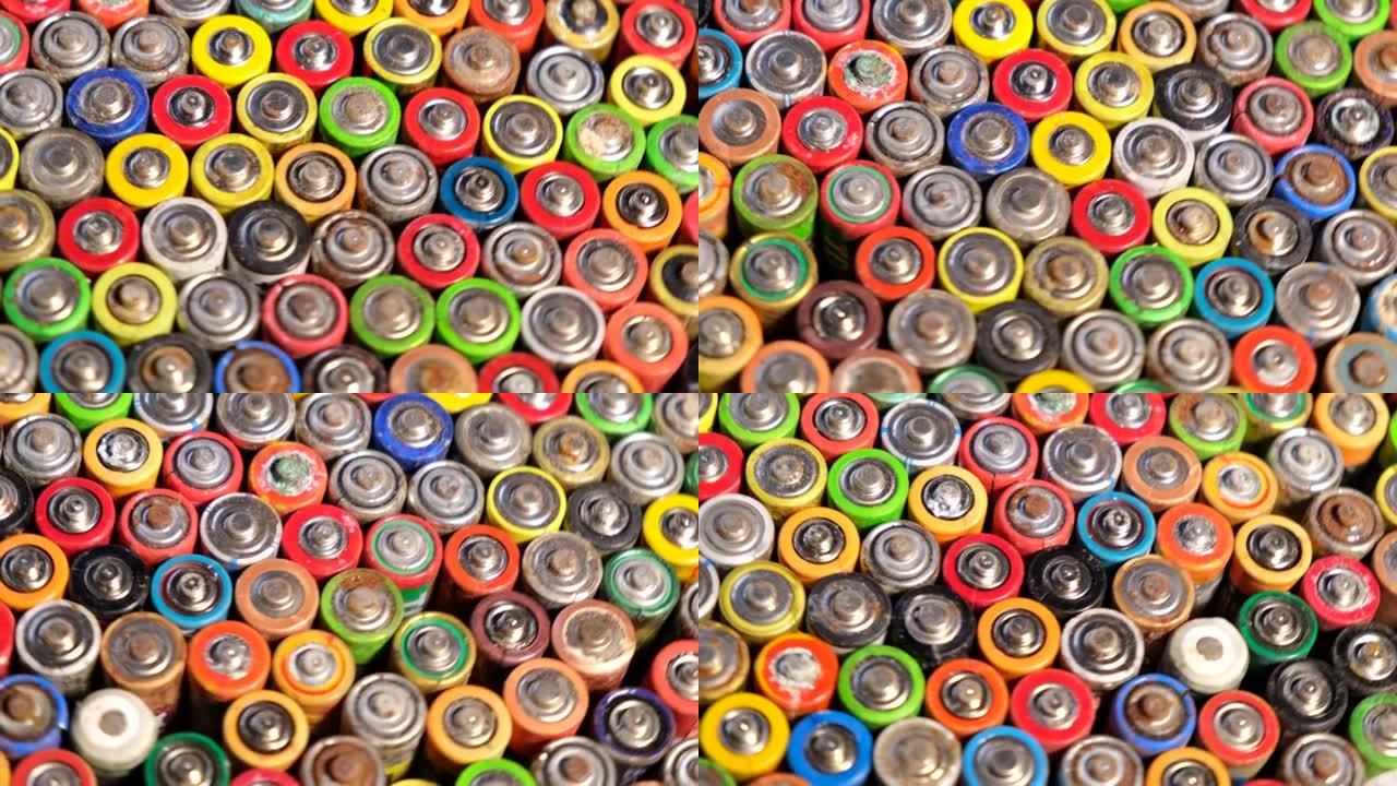 堆中AA废旧电池的类型。对环境的高度危险。