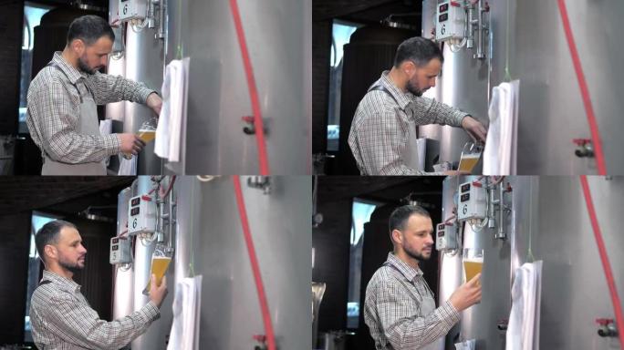 一家现代化的啤酒厂。酿酒商检查刚酿造的啤酒