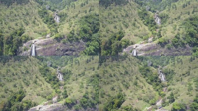 Diyaluma在绿色森林中瀑布陡峭的悬崖上瀑布