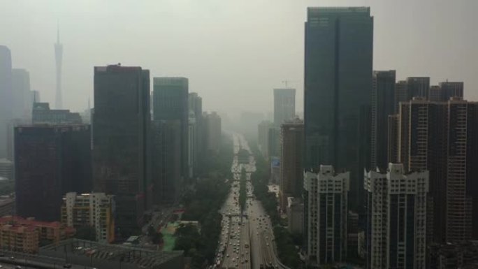 阳光烟雾广州市中心交通街路口空中全景4k中国