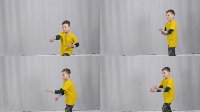穿着黄色t恤的运动员以站立姿势运动，并在跳跃中挥拳