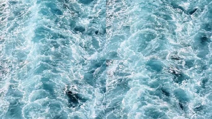 从渡船上沸腾着爱琴海的蓝色海水。慢动作。希腊