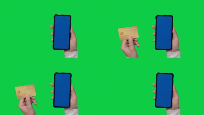 女性顾客手拿着信用卡和智能手机，色度键绿屏背景上的蓝屏。