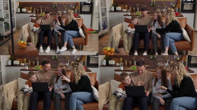 快乐的聋哑家庭在笔记本电脑上观看视频