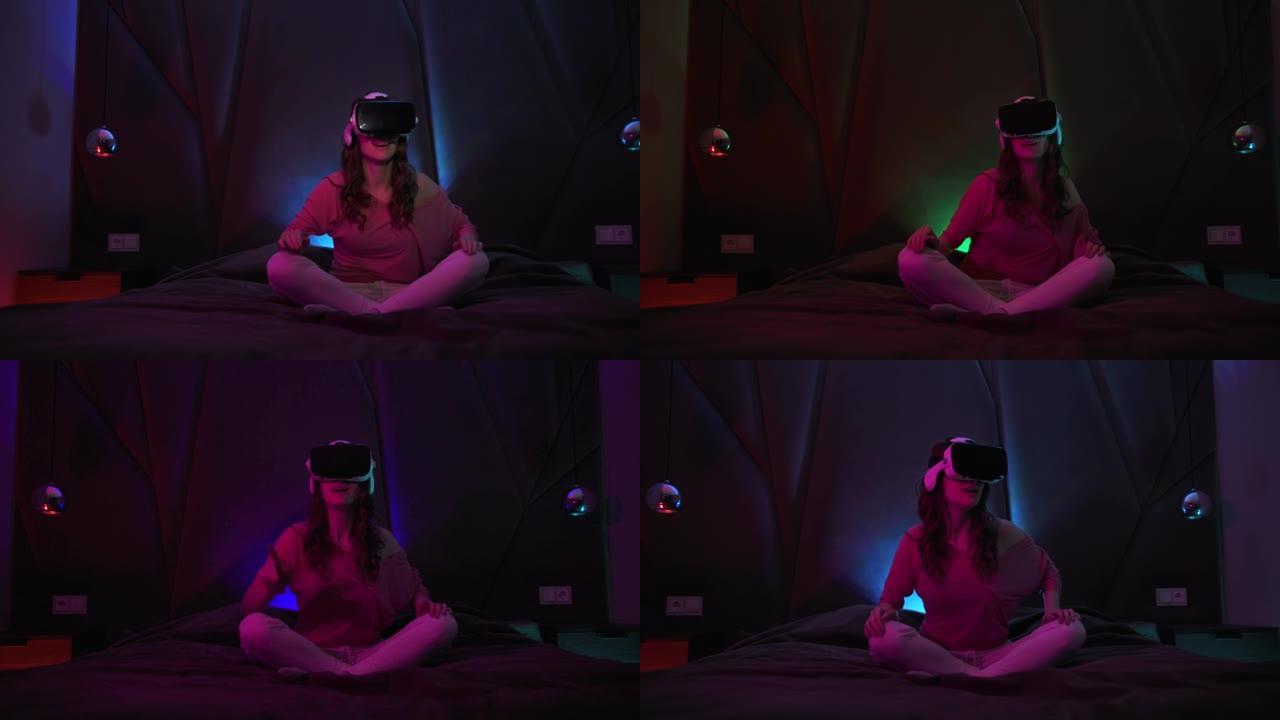虚拟现实未来女性使用虚拟现实耳机，在彩色照明的互动技术展览中环顾四周。