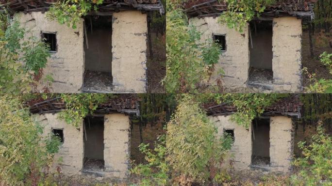 由心情和木制原木制成的废弃小屋4k无人机视频