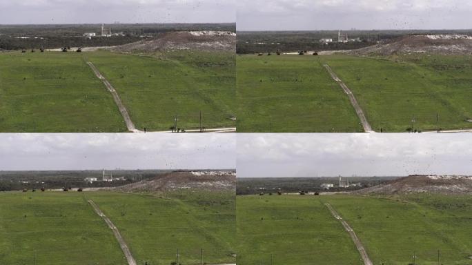 美国佛罗里达州垃圾填埋场卫生场地和废物管理厂的鸟瞰图。带有平移相机运动的无人机制作的镜头。