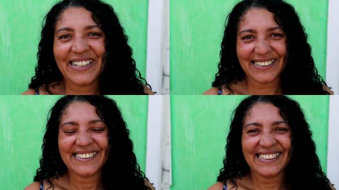 快乐的西班牙裔女人微笑着。拉丁美洲南美的休闲人，真实的人