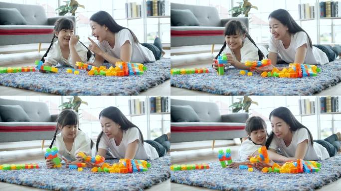 亚洲母子一起玩积木玩具