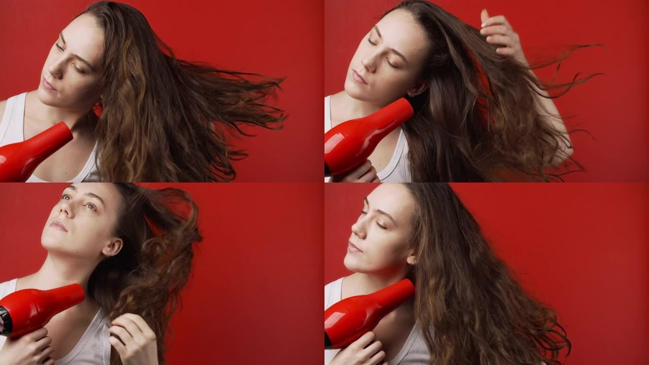 白人妇女在红色背景上干燥长发的视频