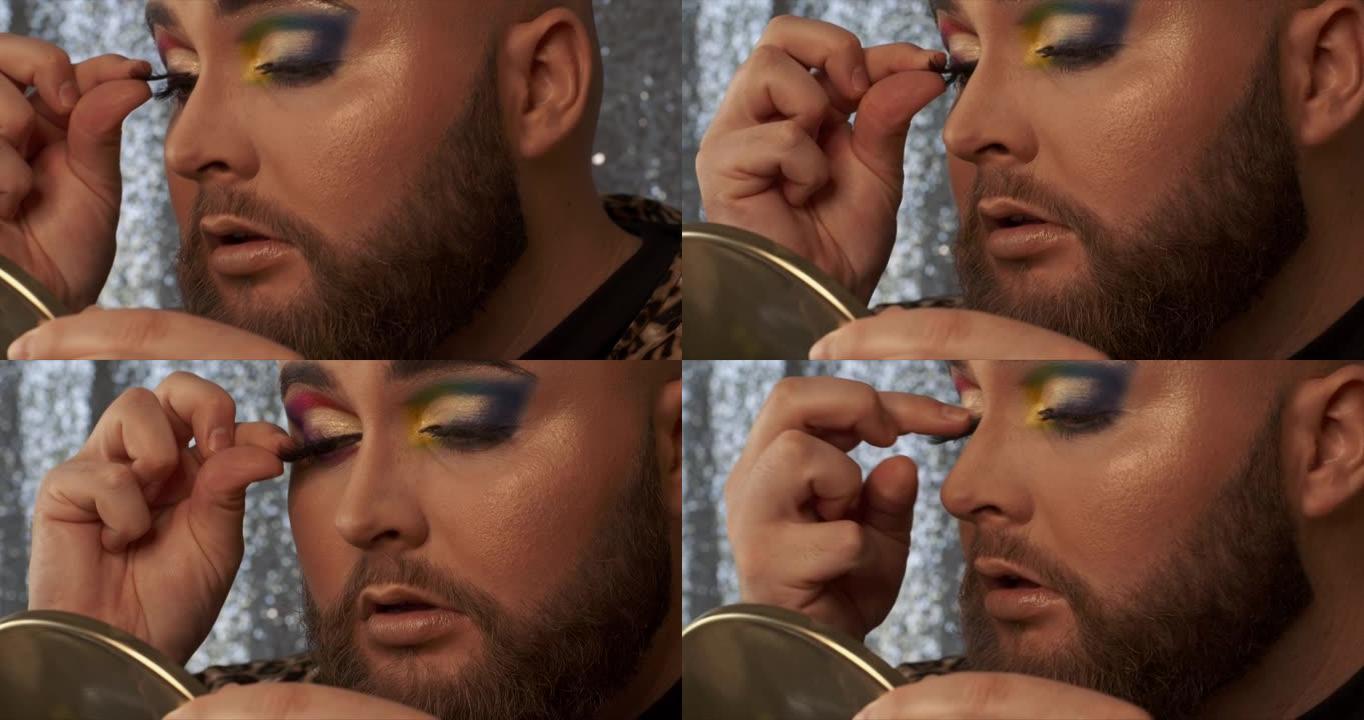 一名男性化妆师在自己的睫毛上涂抹假骨灰的4k视频片段