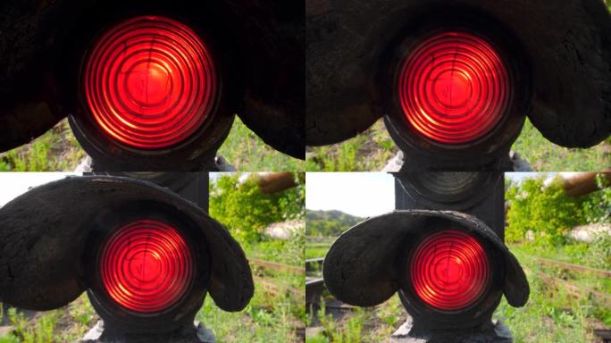 旧铁路红灯信号灯的4k多莉视频。铁路运输和货物的概念
