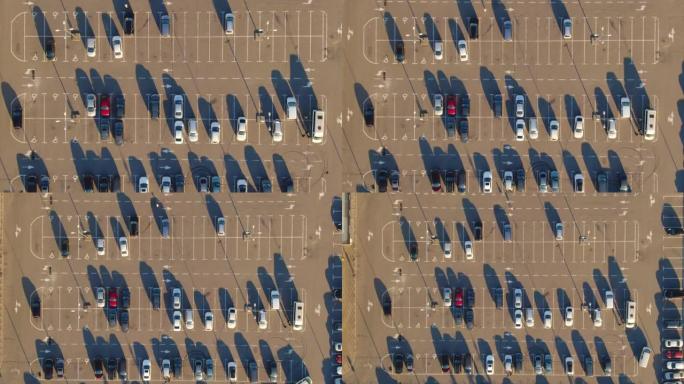商场停车场的空中俯视图，有车有空位