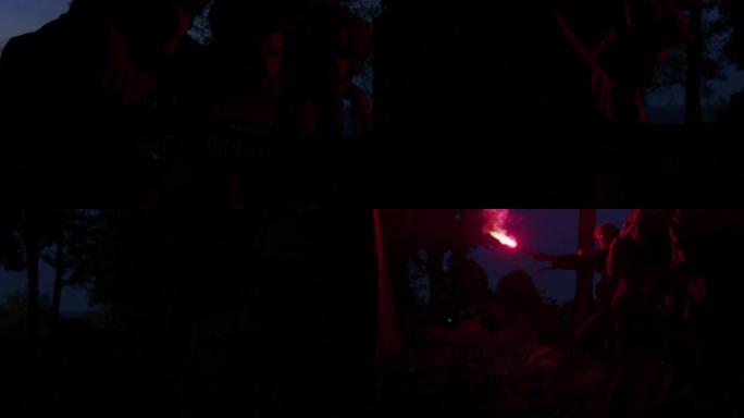 在密林中进行军事行动时，一群士兵使用照明弹来表明自己的位置