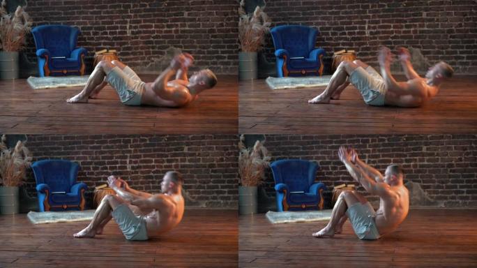运动男子在家里做腹肌练习在地板上的嘎吱嘎吱声，侧视图。