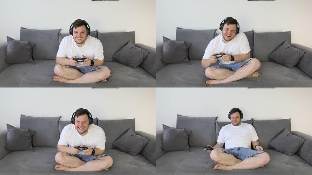 男子在游戏机上玩电子游戏不同的情绪愤怒的幸福