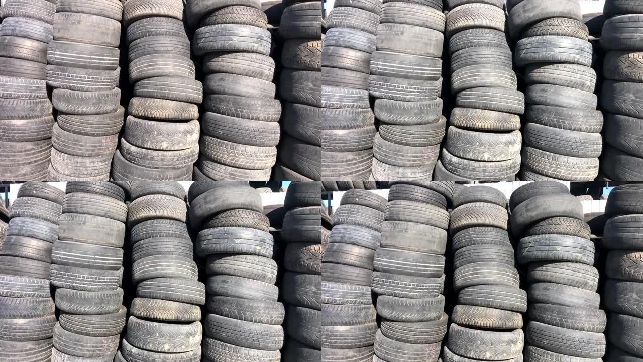 废旧汽车轮胎填埋。智能手机的垂直视频