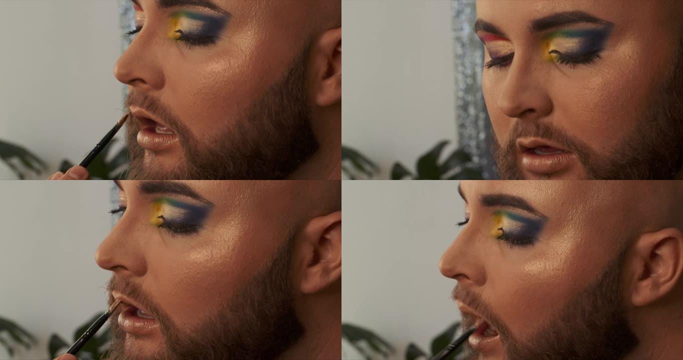 一名男性化妆师在嘴唇上涂抹唇部产品的4k视频片段