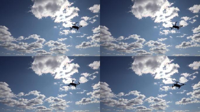 无人机在蓝天中机动。用无人机相机飞行和拍摄。