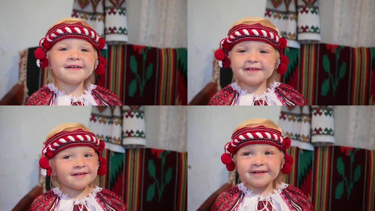 穿着旧乌克兰vyshyvanka服装的小女孩的肖像，微笑着