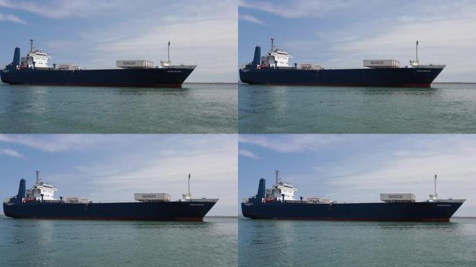 接近国际集装箱港口的货船。4k分辨率。